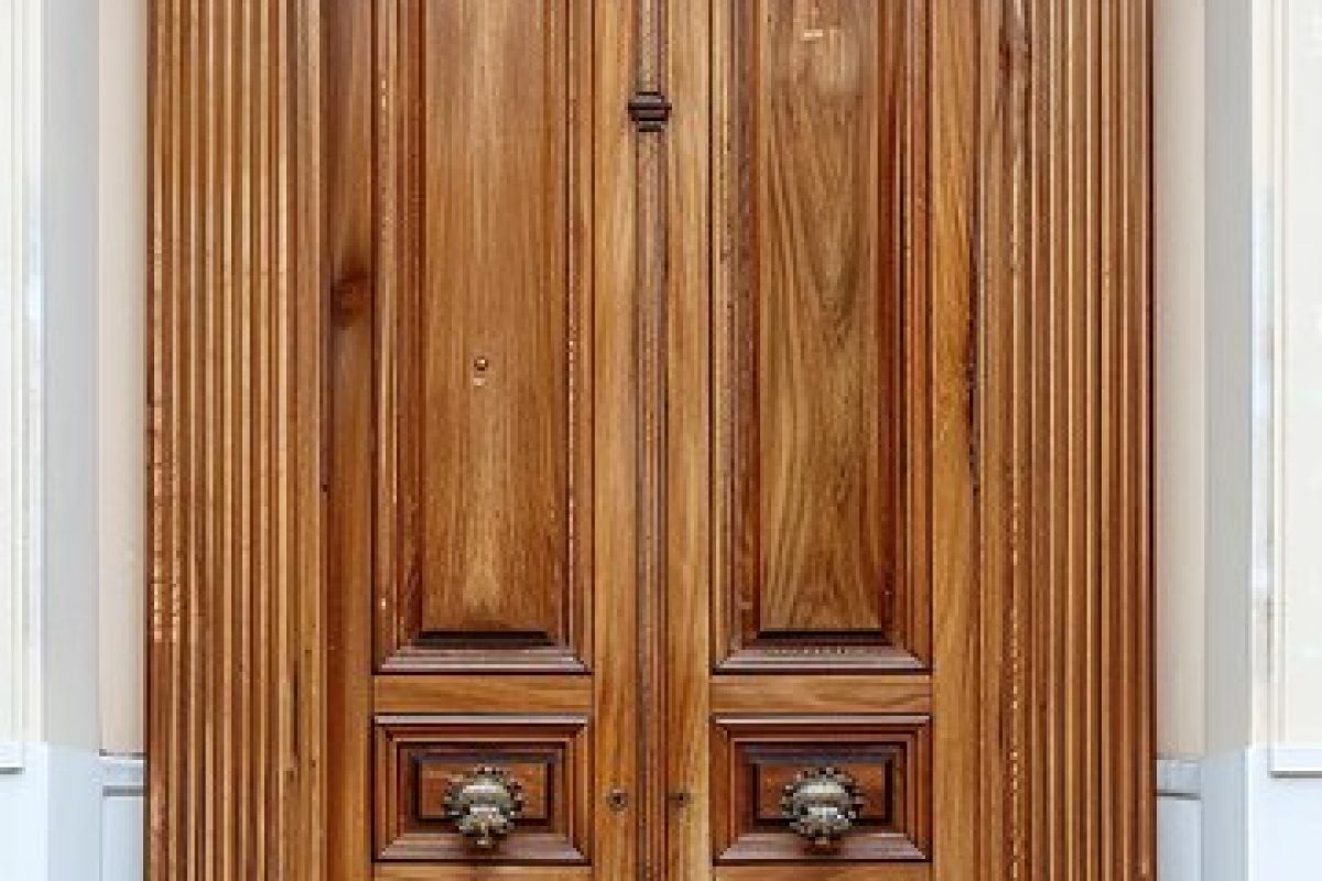 large-wooden-door-with-wooden-frame-that-says-word-it_1124573-58127